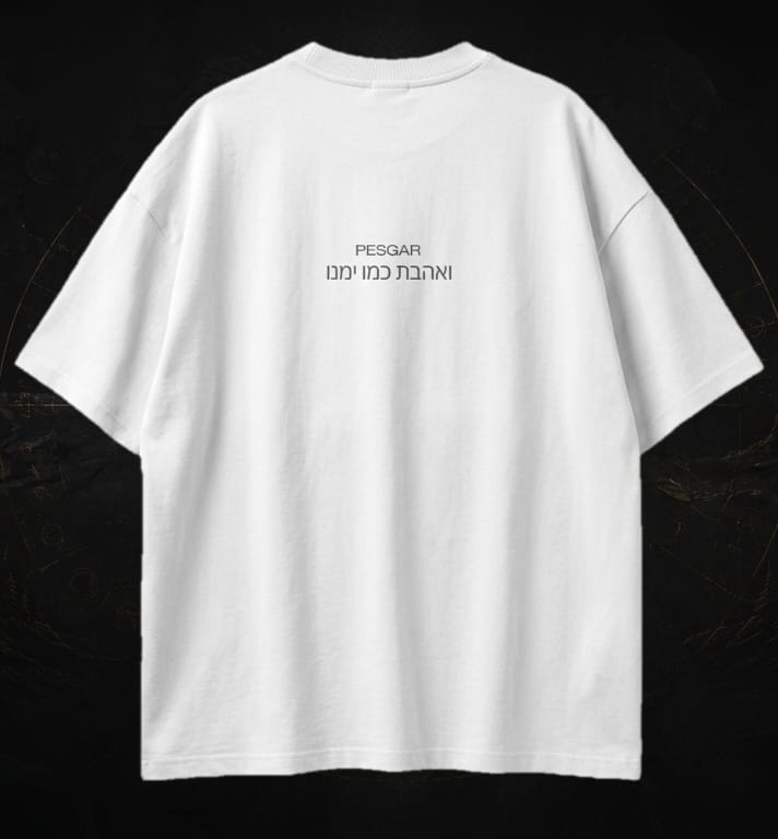 White t-shirt with black text on a black background